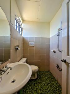 Vonios kambarys apgyvendinimo įstaigoje Screaming Gecko Hostel Air-Con