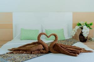 Letto o letti in una camera di The Infinity Suite Chiangrai