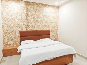 Hotel Divine Inn客房内的一张或多张床位
