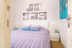 Ένα ή περισσότερα κρεβάτια σε δωμάτιο στο Charmant appartement vue mer Les Sables - 2 personnes