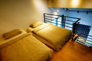 Postel nebo postele na pokoji v ubytování Pathway Inn