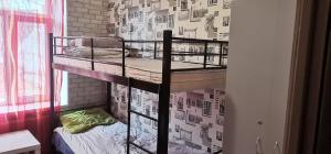 a couple of bunk beds in a room at Kosher Hostel in Odesa