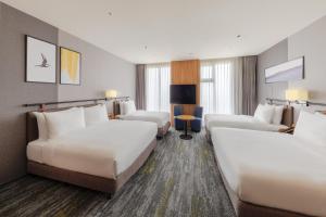 voco Chiayi by IHG客房内的一张或多张床位