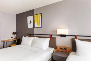 voco Chiayi by IHG客房内的一张或多张床位