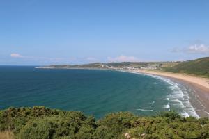 a view of the beach from the cliffs at Montgomery Barn in Bideford