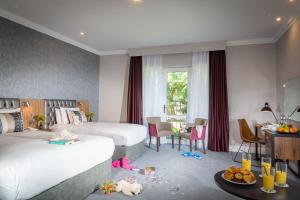 Postel nebo postele na pokoji v ubytování Talbot Hotel Midleton