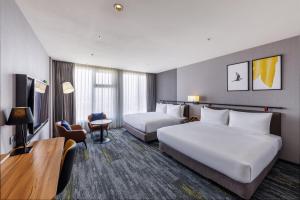 voco Chiayi by IHG客房内的一张或多张床位