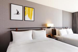 voco Chiayi by IHG客房内的一张或多张床位