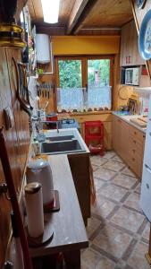 A kitchen or kitchenette at Ferienhaus für 5 Personen ca 85 qm in Barczewo, Masuren-Ermland Masurische Seenplatte