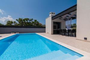 The swimming pool at or close to Villa Neva ZadarVillas