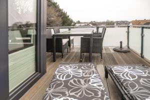 Balkón nebo terasa v ubytování Baltic House Penthousewohnung Seebrücke