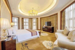 Μια τηλεόραση ή/και κέντρο ψυχαγωγίας στο Days Hotel by Wyndham Logan City Huizhou