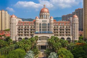 a large white building with a domed building at Days Hotel Logan City Huizhou in Huizhou