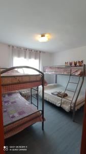 Posteľ alebo postele v izbe v ubytovaní Miami APARTAMENTO CORI