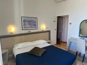 Postel nebo postele na pokoji v ubytování Riviera Mare Beach Life Hotel