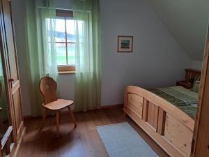Ένα ή περισσότερα κρεβάτια σε δωμάτιο στο Dachberghof
