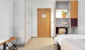 Postel nebo postele na pokoji v ubytování Student Hostel