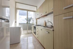 Nhà bếp/bếp nhỏ tại Appartamenti Rivabella Carpediem