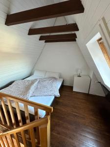 מיטה או מיטות בחדר ב-Maries Stadthaus