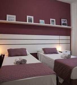Postel nebo postele na pokoji v ubytování Hotel Marlen