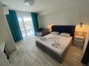 Sunny Beach Potos客房内的一张或多张床位