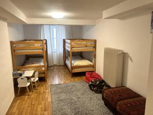 Ein Bett oder Betten in einem Zimmer der Unterkunft Brauereigasthof zur Münz seit 1586