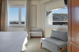 Postel nebo postele na pokoji v ubytování Hotel Parma