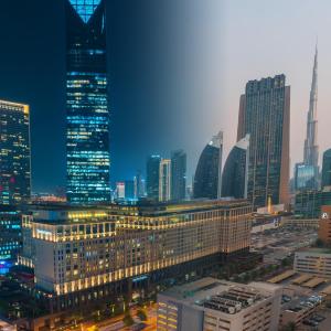 uma vista para o horizonte da cidade à noite em Ritz Carlton DIFC Downtown Dubai no Dubai
