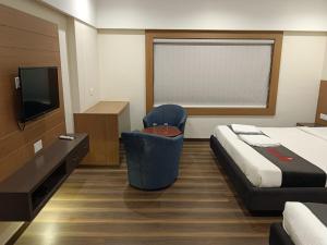 TV a/nebo společenská místnost v ubytování Hotel welcome somnath