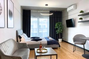 Χώρος καθιστικού στο apartamenty-wroc Center by the University Bridge