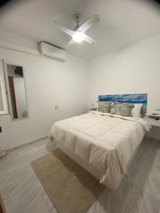 Postel nebo postele na pokoji v ubytování Hostal RENCH