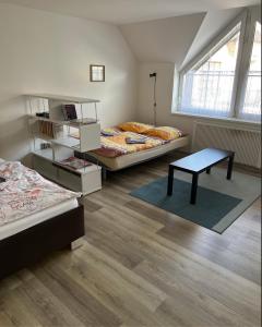 Postel nebo postele na pokoji v ubytování Apartman Discoveryou