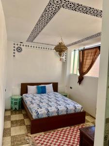 Postel nebo postele na pokoji v ubytování Riad Cascada