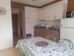 Kuchyňa alebo kuchynka v ubytovaní Apartamentos Vista
