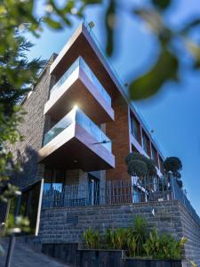 Fotografie z fotogalerie ubytování Grey Escape Apartments v destinaci Qalḩāt