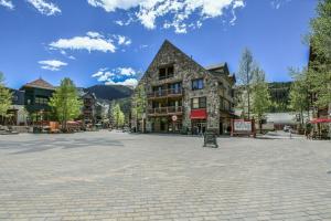 a large square in a town with a building at Black Bear 8053 in Keystone