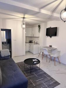 a living room with a couch and a table at Lena 2 in Jajce