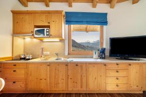 Η κουζίνα ή μικρή κουζίνα στο Obermoarhof Mutspitze 1