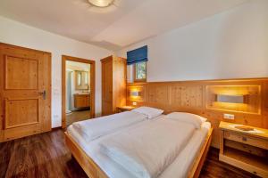 Ένα ή περισσότερα κρεβάτια σε δωμάτιο στο Obermoarhof Mutspitze 1