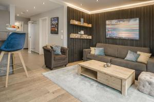 Posezení v ubytování Beach House Penthousewohnung Düne