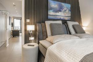 Postel nebo postele na pokoji v ubytování Beach House Penthousewohnung Düne