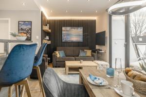 Posezení v ubytování Beach House Penthousewohnung Düne