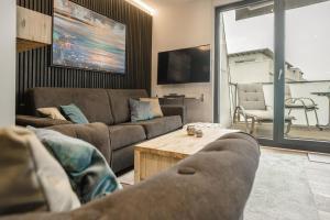 Posezení v ubytování Beach House Penthousewohnung Düne