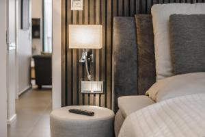 Postel nebo postele na pokoji v ubytování Beach House Penthousewohnung Düne