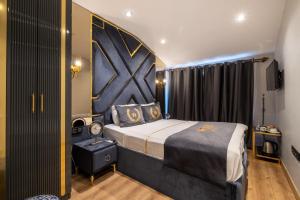 A bed or beds in a room at Wind Suit