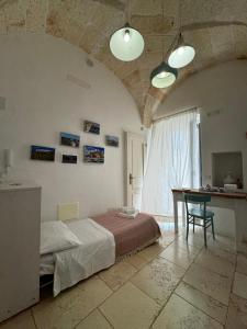 Postel nebo postele na pokoji v ubytování Casa Mida - Guest House