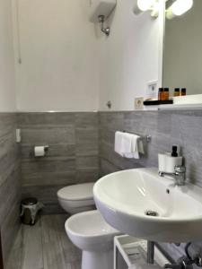 Koupelna v ubytování Hotel Cecile