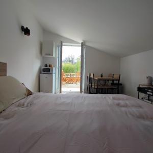 Postel nebo postele na pokoji v ubytování Chambre d'hôtes