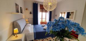 A bed or beds in a room at Casa Al Castello