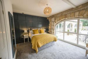 מיטה או מיטות בחדר ב-Kingfisher